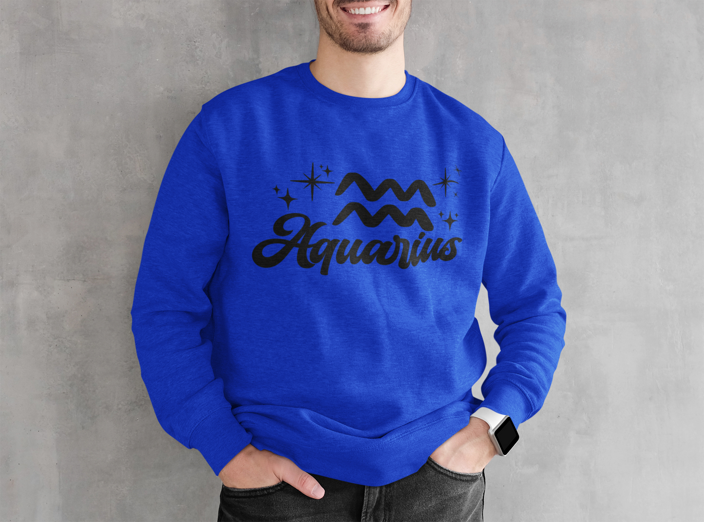 Person wearing an blue sweatshirt with 'Aquarius' black text design against a gray background