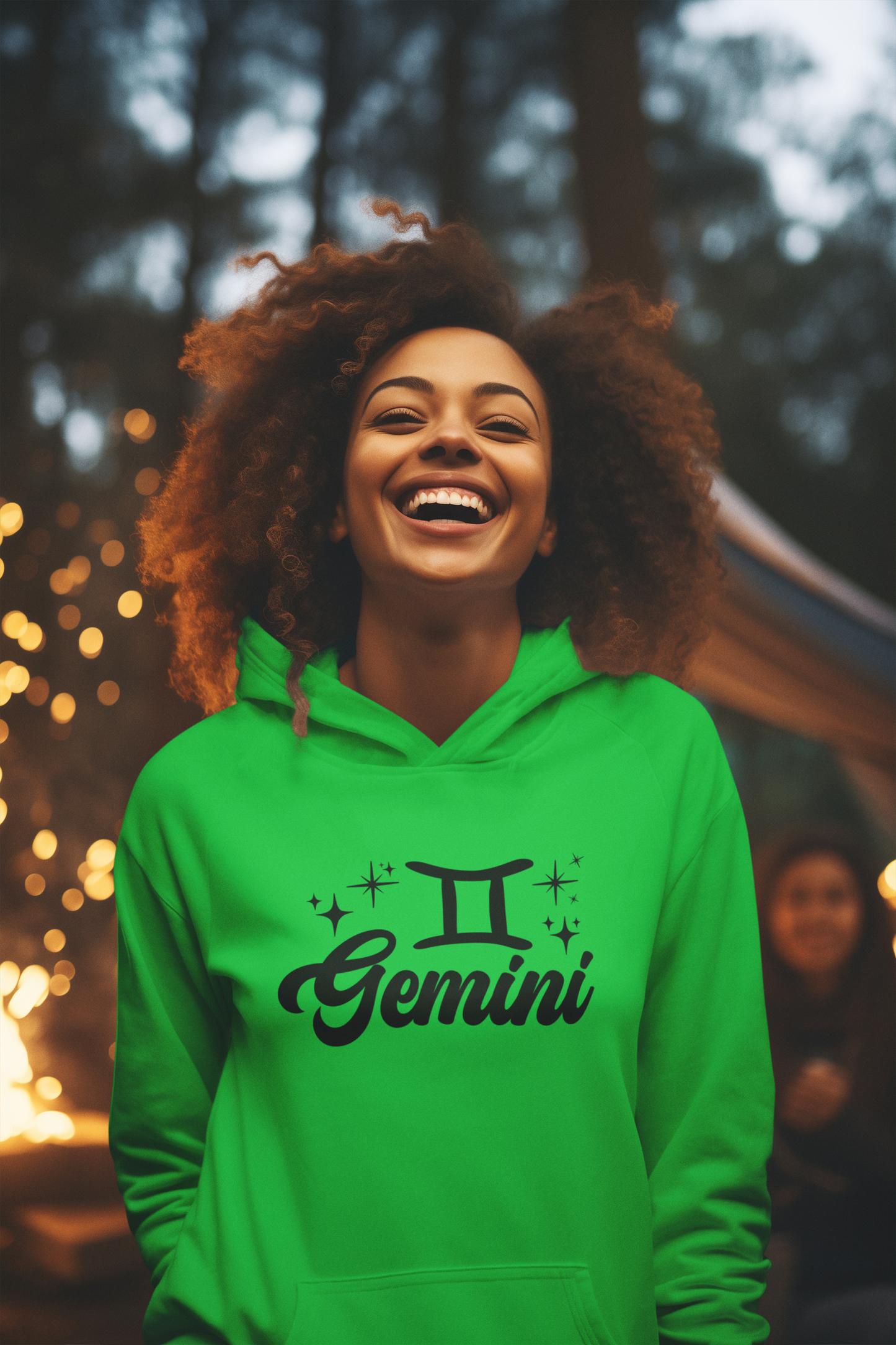 Person wearing a green hoodie with 'Gemini' black design in a festive outdoor setting