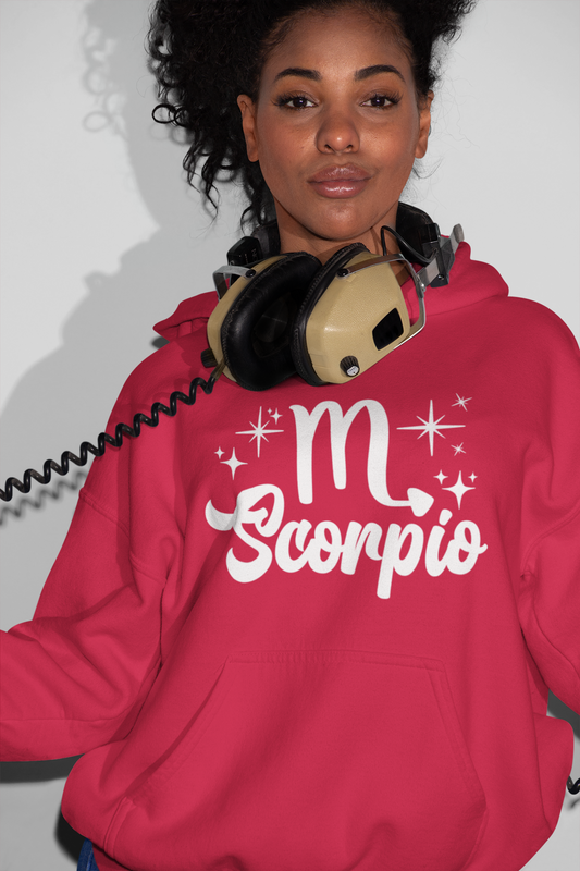 Person wearing a red hoodie with 'Scorpio' white text design, with headphones 
