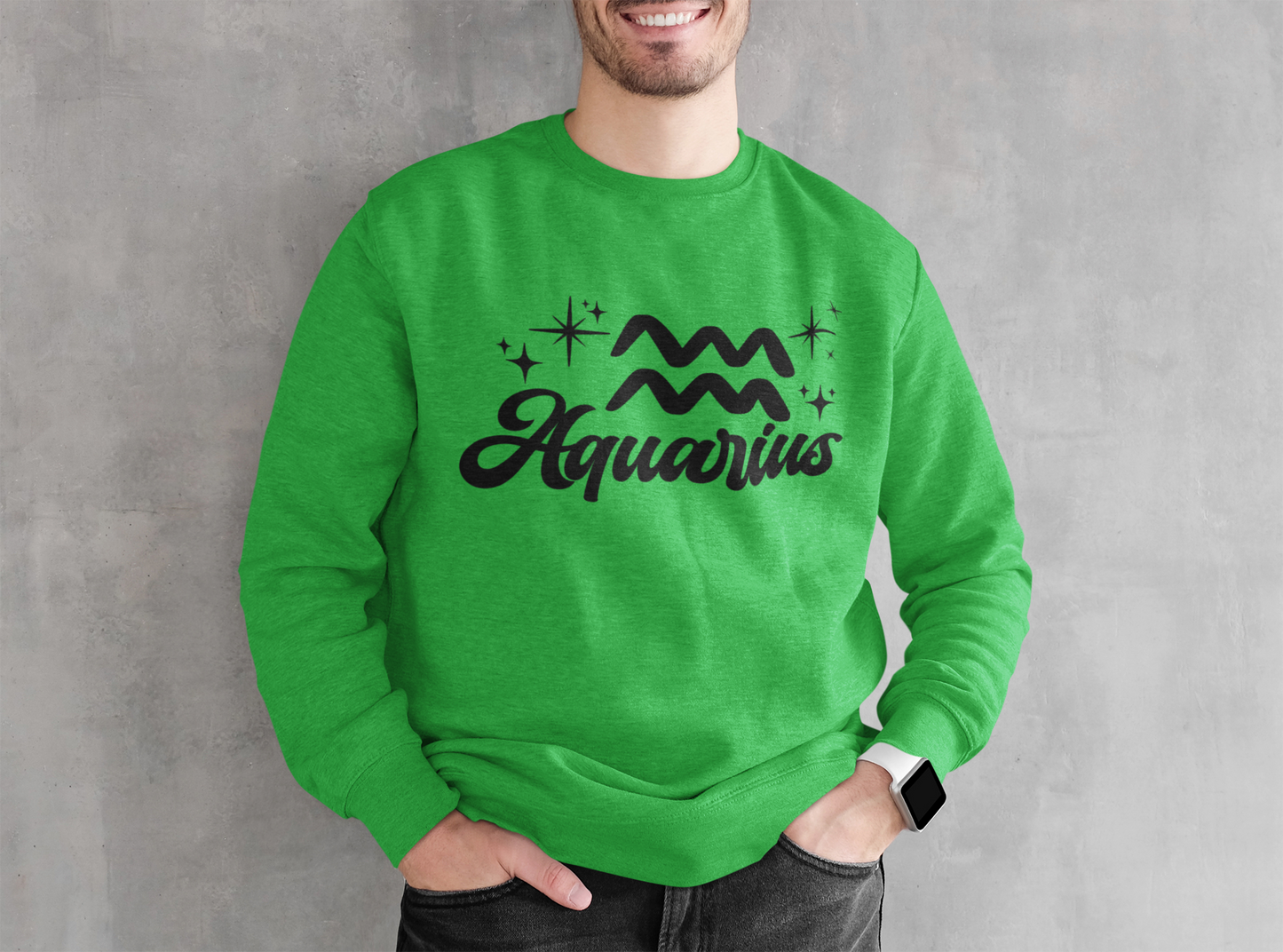 Person wearing an green sweatshirt with 'Aquarius' black text design against a gray background