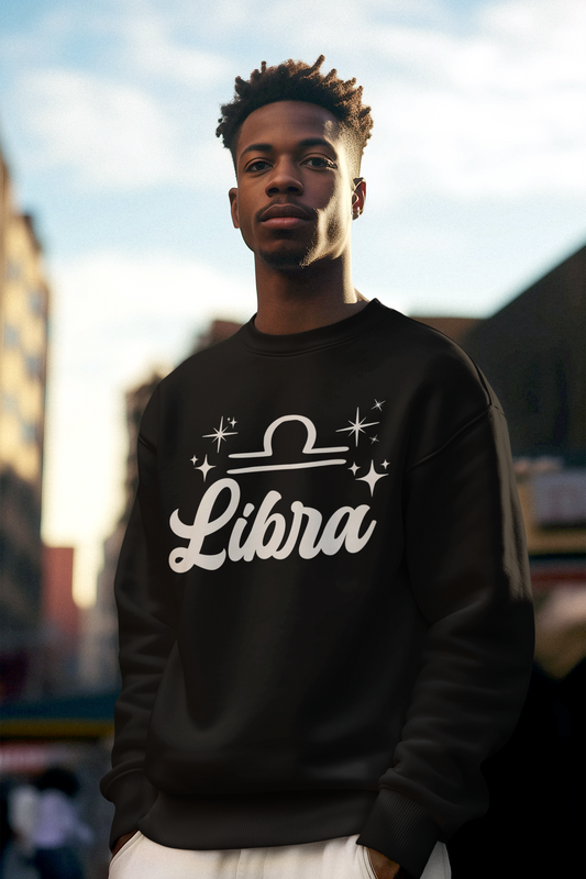 Person wearing a black sweatshirt with 'Libra' white text design outdoors