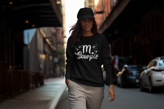 Person wearing a black sweatshirt with 'Scorpio' white text design walking on a street.